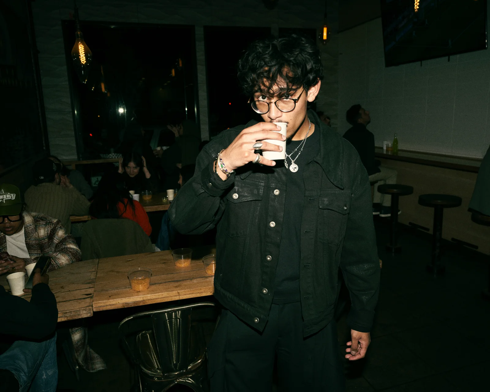 Nabeel Thotti drinking chai in a café in the United States
