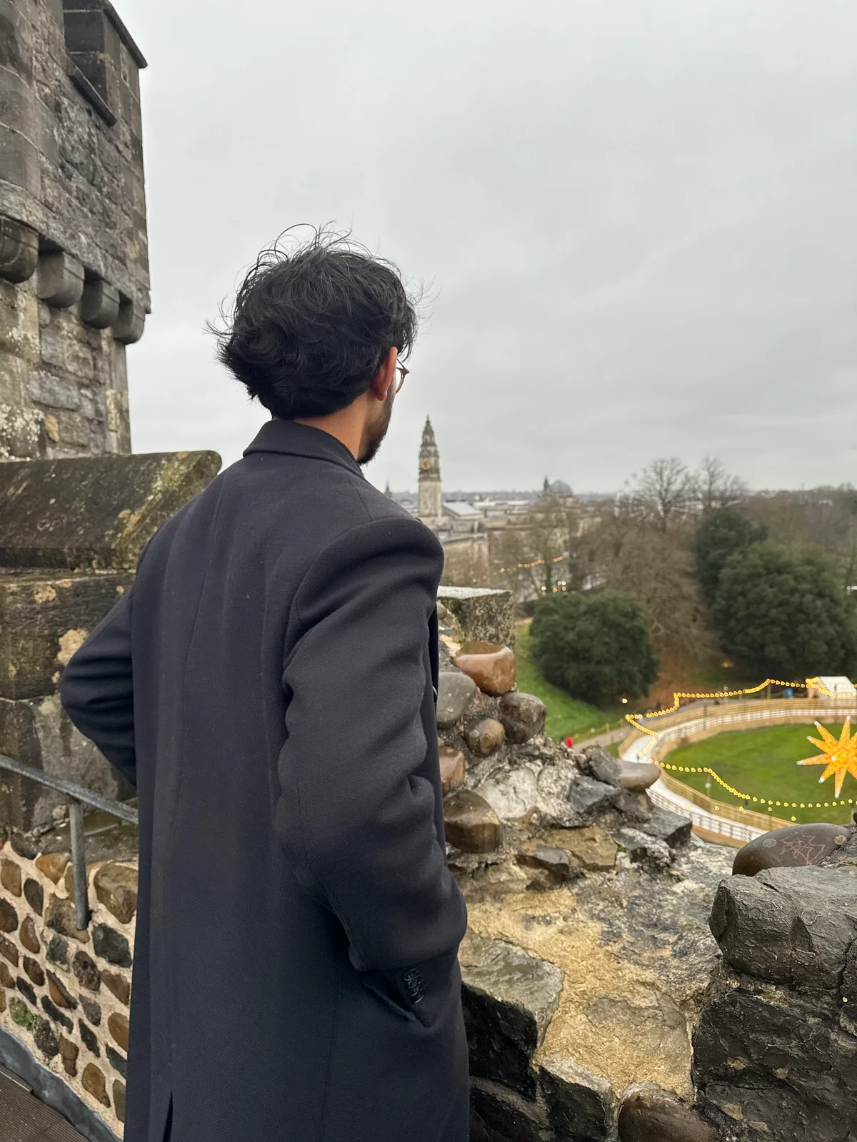 Nabeel Thotti looking out from a castle in Wales